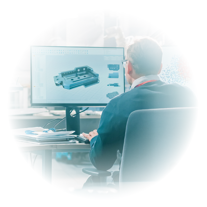 An engineer reviewing a 3D CAD model of a part on screen
